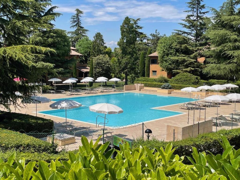 Appartement Casa Vittoria Sirmione Punta Gro Con Piscina Extérieur photo